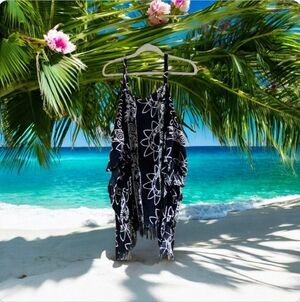 Dream Island beach cover up black with designs in great condition fringe…